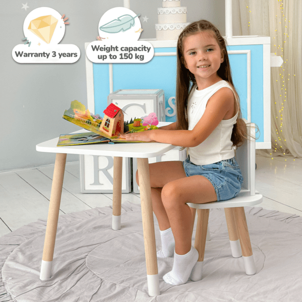 Weißer rechteckiger Tisch und weißer Kinderstuhl mit einem Bild von einem Hasen – Bild 6
